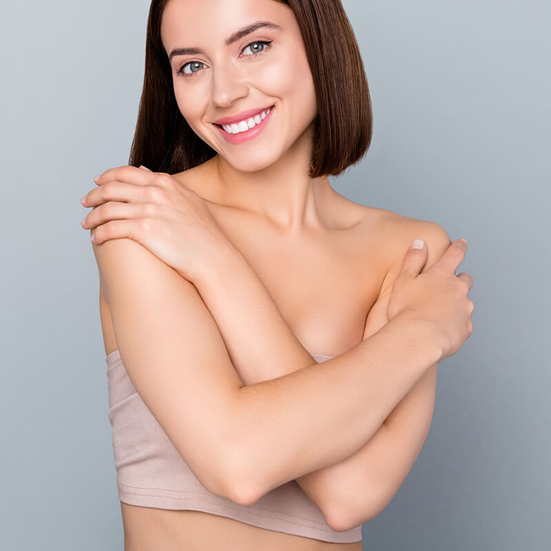 Woman with her arms crossed over her chest